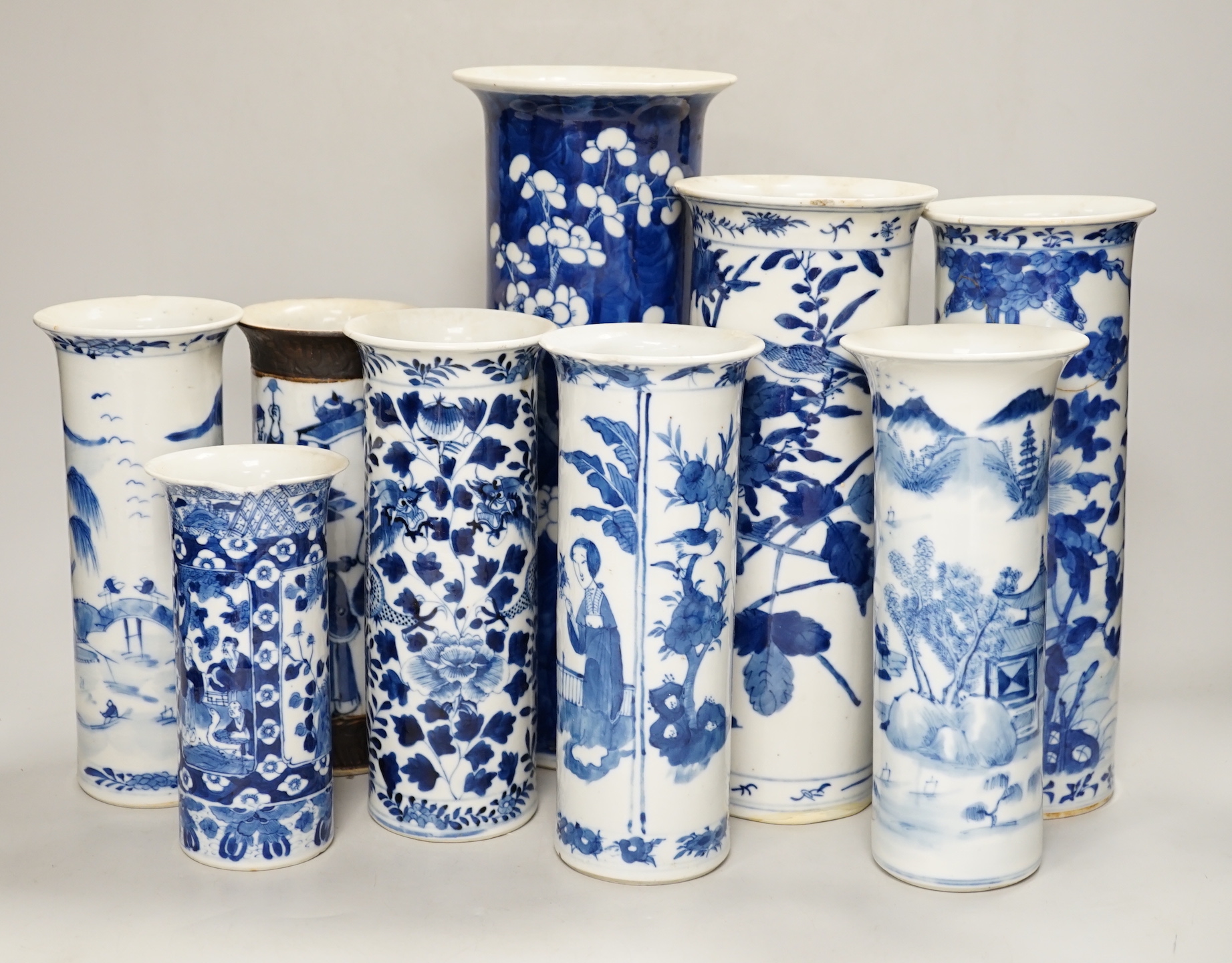 Nine assorted Chinese blue and white cylinder vases, 19th/20th century, tallest 30cm high (a.f.)